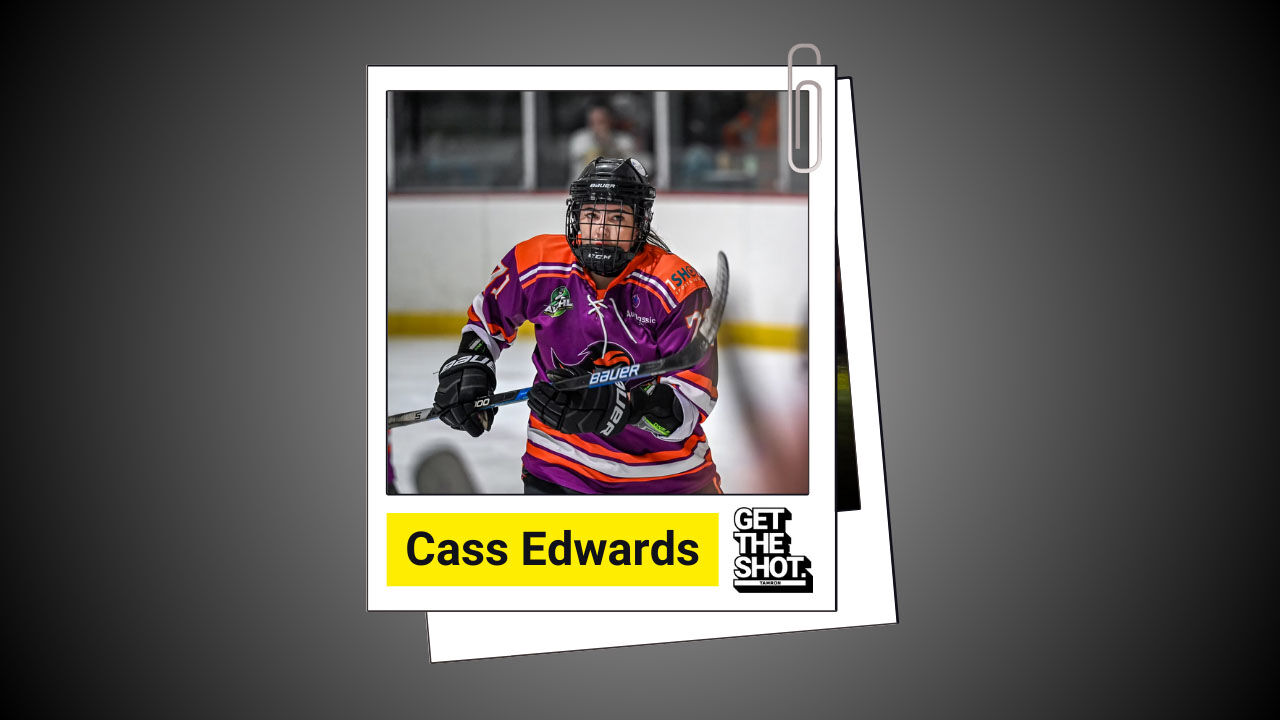 High-quality hockey player action shot with vivid colours and sharp focus.
