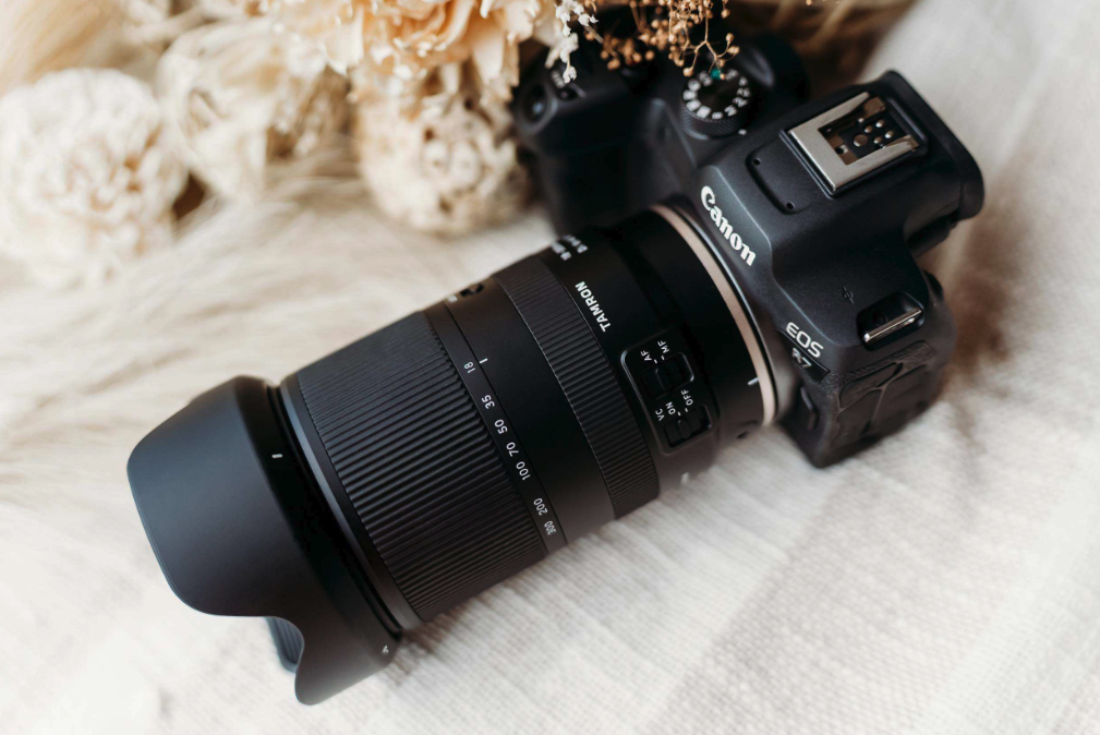 Tamron Lens in Use for Photography Canon camera with Tamron lens for versatile photography.