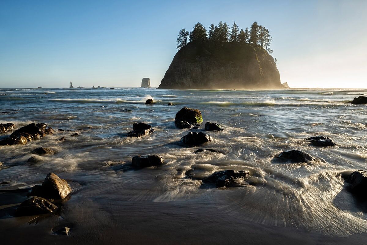 Scenic coastal view captured with a Tamron lens at sunset.