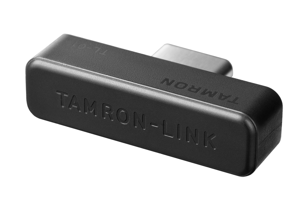 Tamron Link Camera Accessory Tamron Link device used with camera for enhanced connectivity.